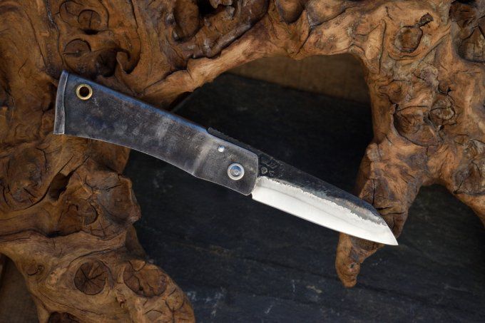 Couteau pliant à friction, manche en acier, système deux clous