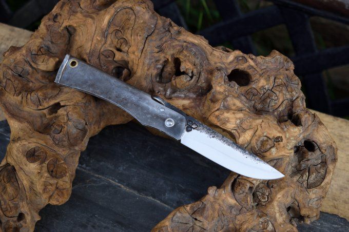 Couteau pliant à friction 20cm, manche en acier, système deux clous